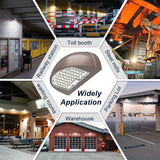 Installed LFD Half Moon wall pack light illuminating commercial building exterior at night.